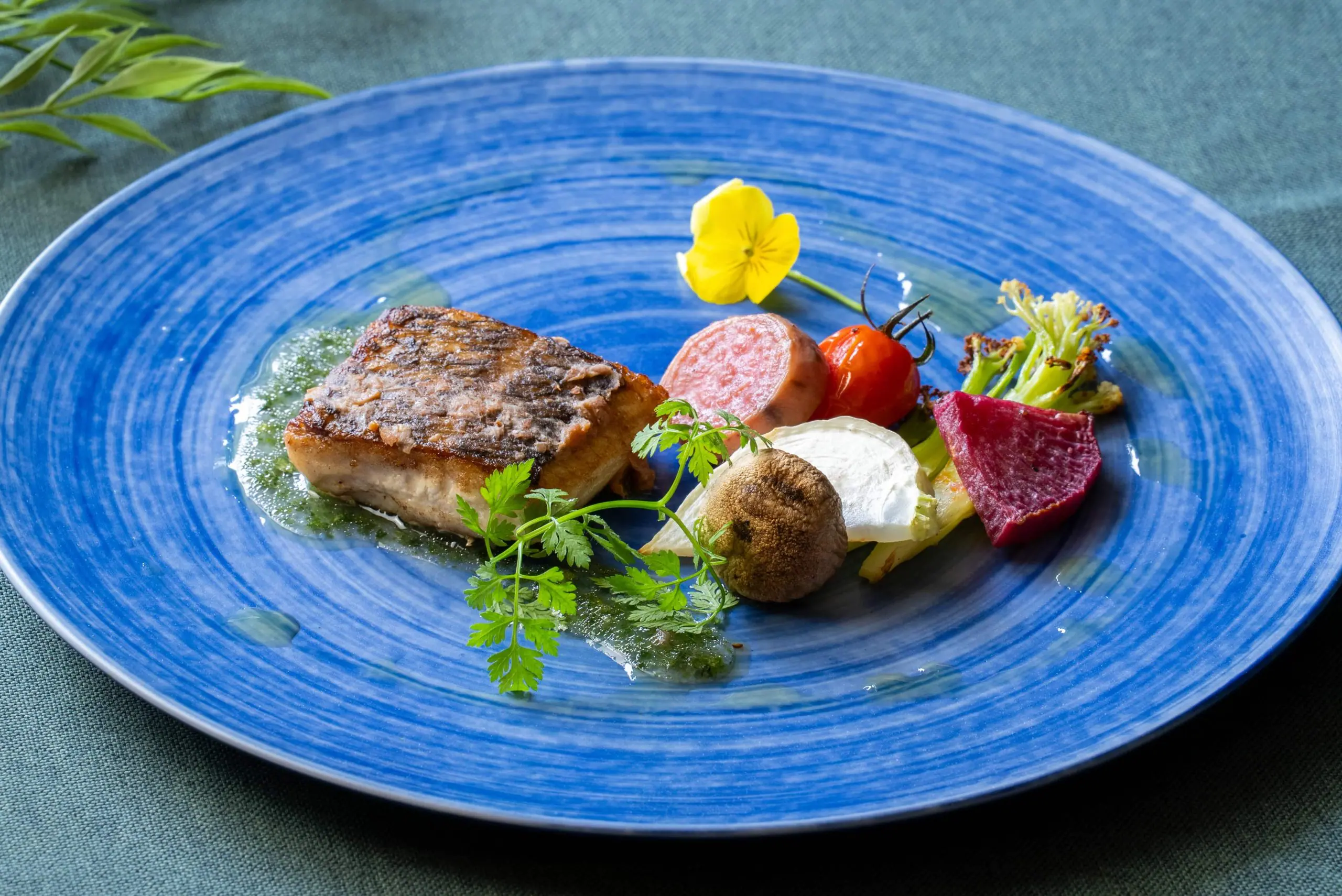 真鯛のポワレ　埼玉県産ヨーロッパ野菜と地元越生町の名産 “山口農園さんの梅” を使用したソースと共に